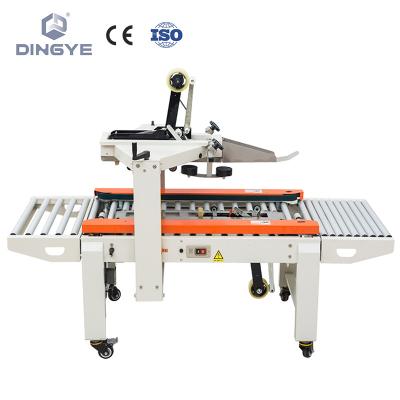 China FXC4050XFG Small Beverage Carton Sealer Box Sealing Packaging Machine With Side Belt Conveyor for sale