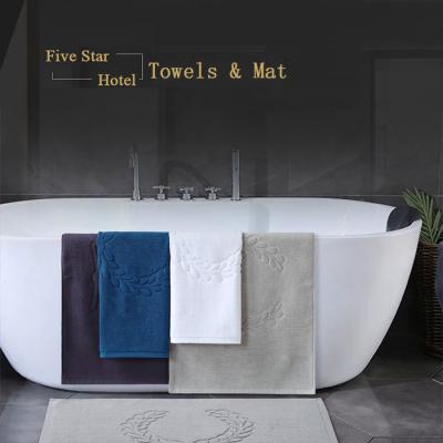 China Stocked Hotel Five Star Carpet Waterproof Non-slip Absorbent Customize Jacquard Design Luxury White Color Anti-slip 100% Cotton Hotel Bath Mat for sale