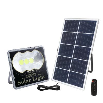 China Garden.Outdoor 30w 60w 100w 200w 300 Watt Solar Flood Lights Garden Outdoor Wall Waterproof COB Remote Control IP66 Solar Street Flood Light for sale