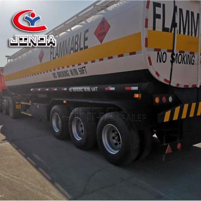 China Hot Selling Truck Trailer In Nigeria 45,000L Fuel Tank Truck Petrol And Oil Semi Trailer With 1 Inch Manhole Cover for sale