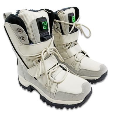 China Latest Fashion Usb Battery Heated Boots Durable Winter Outdoor Shoes Electrically Heated Shoes For Women Man Use for sale