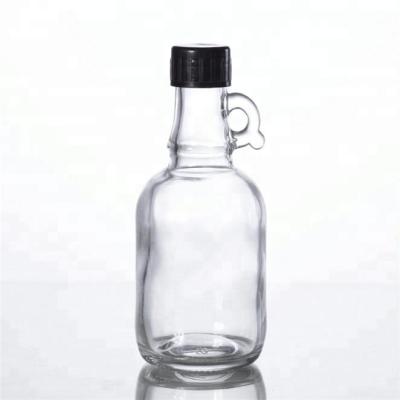 China Wholesale Beverage Price Round Shape 16oz 12oz Oval Glass Bottle With Handles Syrup With Self Sealing Cap for sale