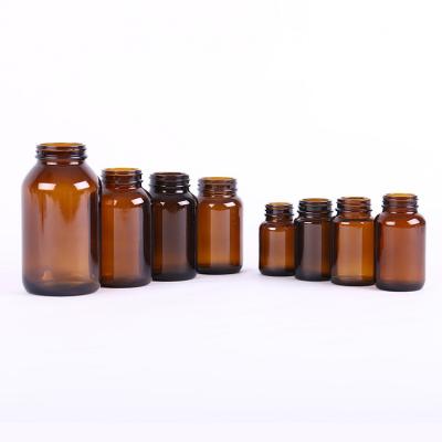 China Amber Packers 100ml 150ml 250ml 300ml Brown Classic Medicine Wide Mouth Pharmacy Glass Bottle With Metal Lids for sale