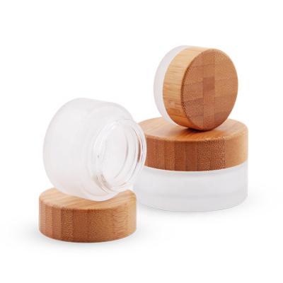 China Skin Care 15ml 30ml 50ml 100ml Empty Cosmetic Packaging Bamboo Frosted Glass Lid Face Cream Cream Jar for sale