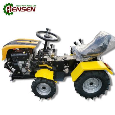 China Sincronización de pequeños tractores de jardín diesel amarillo naranja mini tractor agrícola en venta