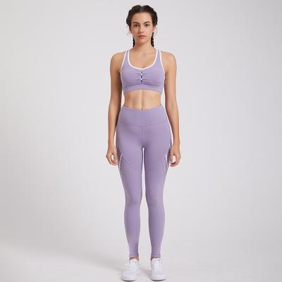 China Breathable Europe And USA New Fitness Suits Solid Color Polyester Womens Yoga Suits for sale