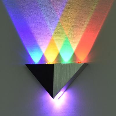 China Modern fashion triangle wall lamp living room bedroom bedside lamp creative led color aisle aisle ktv lamp for sale