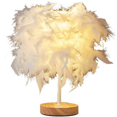 China Modern Nordic Creative Light Night Lamp Gift Lamp Bedroom Bedside Luxury Feather Table Lamp for sale