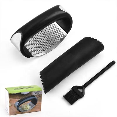 China Kitchen Instruments 2022 Garlic Cleaver 304 Stainless Steel Metal Garlic Crusher Viable Manual Garlic Press for sale