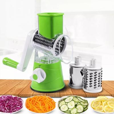 China Viable Rotary Manual Vegetable Chopper Roller Slicer Multifunctional Kitchen Instrument Vegetable Cutter Grater for sale