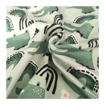 China 100% poly waterproof interlock printed fabric custom design pul fabric for baby diaper diaper for sale