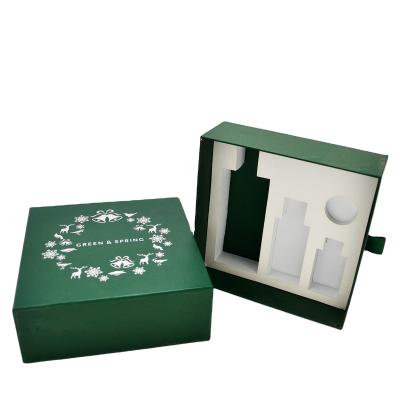 China Handmade Green Printing Slip Box Silver Foil Logo Slide Out Drawer Paper Cardboard For Skin Care for sale