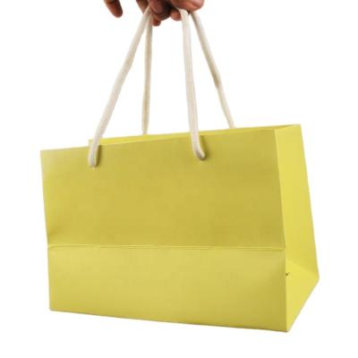 China Recyclable Custom Factory Wholesale Citrus Paper Handbag YellowHandle Bags Packaginggift Box for sale