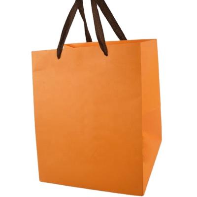 China Recyclable Custom Printing Luxury Packaging Bag Cardboard Tote Bag Shop Packaging Bags Shoes And Apparel Packaging Recyclable for sale