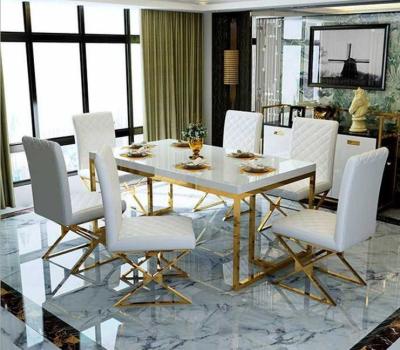 China Modern Light Luxury Rectangular Dining Table Chair Set Stainless Steel Dining Table for sale