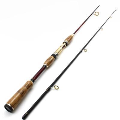 China Carp Wooden Bait Trout Carbon 2.1m Carbon Fiber M Handle Fishing Rod Super Hard Spinning Fishing Rod for sale