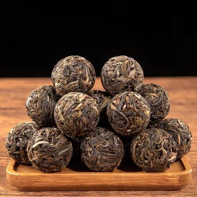 China Tea Drinks Free Samples Raw Yunnan Puer Puer Tea Packing Elegant Puer Tea Ball for sale