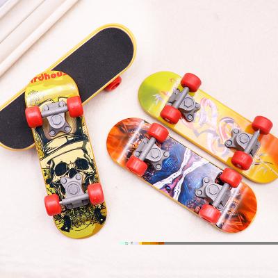 China 13.8*4.3*2.7 Plastic Soft Sensitivity Finger Exercise Skateboard Toy Personalized for sale