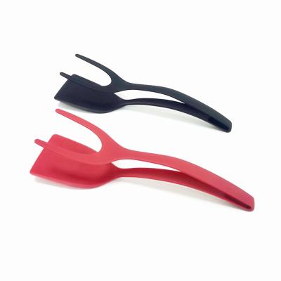 China Durable Handle and Flip Tongs Spatula 2 in 1 Turner Kitchen Cooking Spatula for Omelet Pancake Egg Frying Nylon Kitchen Cooking Tool for sale