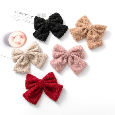 China Popular Korean version of new teddy bear plush web celebrity hair clip autumn winter plush bow girl tie hair clip spring clip for sale