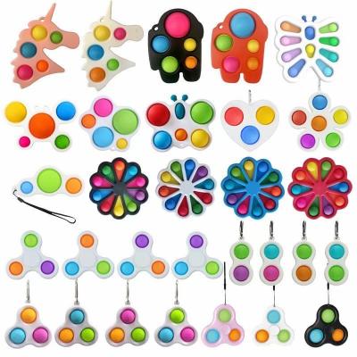 China Silicone Material Eco-Friendly Silicone Material Simple Toys Decompression Wiggle Key Chains Relaxation Plastic Noise Toys for sale