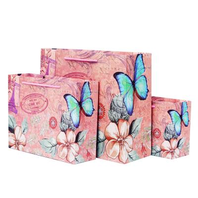 China Factory Direct Wholesale Recycled Materials Ready To Ship Creative Paper Bag Making By Machine Gift Bags Clothes And Shopping Bags for sale