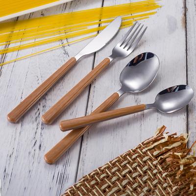 China Wholesale 16PCS Sustainable Plastic Wooden Handle Stainless Steel Cutlery Set for sale