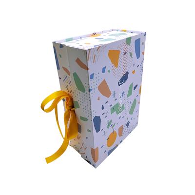 China Custom Recyclable Luxury White Recycled Mailing Rigid Flat Foldable Packaging Gift Box Apparel Pattern Paper Cardboard Box With Ribbon for sale