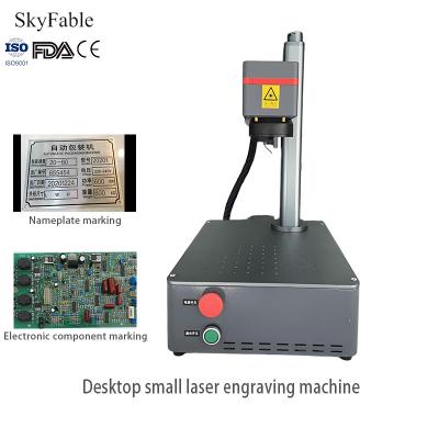 China Compact Desktop Small Laser Engraving Machine For Electronic Components Jewelry Labels for sale