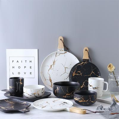 China Sustainable Fashional Kitchen Black And White Tableware Made In Porcelain Marble Design For Dinner for sale