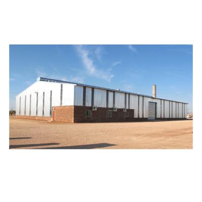 China Low Cost Steel Fabricated Metal Shed Kits House Design Prefab Steel Structure Workshop for sale