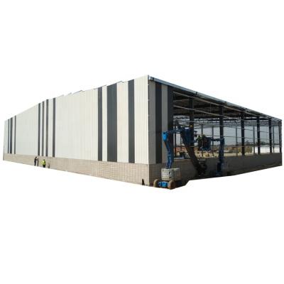 중국 Low cost steel prefab warehouse workshop steel structure ss4oo building multi-storey fabrication 판매용