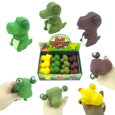 China New Design PVC Anti-stress Educational Funny Animal Eye Snap Sleepy Dino Trick Toy Eye Ball Squeeze for sale