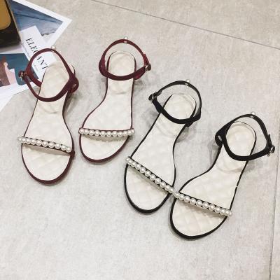 China New Style 2022 Fashion Trend Toe Roman Pearl Women Flat Sandals Fashion Cavity Summer Open Buckle Flat Sandals for sale