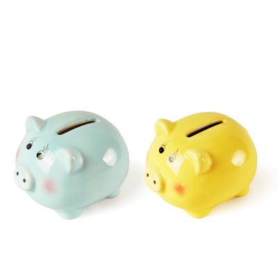 China Modern Custom Ceramic Vivid Blue Yellow Box Coin Bank Money Pig Piggy Bank Saving For Kids for sale