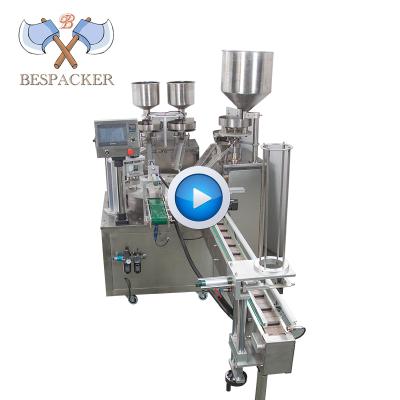 China Automatic Rotary Type Granule Powder Liquid Paste Tray CLOTHING Bespacker Cup Filling And Sealing Machine for sale