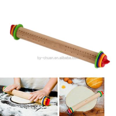 China Sustainable Adjustable Wooden Rolling Pin Dough Cake Roller For Fondant Cake Tools for sale