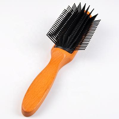 China Paddle wood 9 rows for men hair styling brush salon for sale