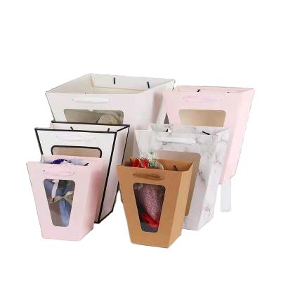 China Recyclable Clear Flower Packaging Bag Flower Recyclable Bolsa De Papel Paper Bag Open Window Trapezoidal Paper Bag for sale