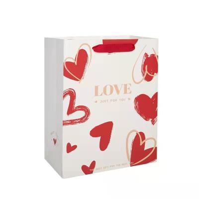 China 2021 Custom Printing Paper Bag Yiwu New Product Luxury Wedding Love Ribbon Ribbon Gift Bag Custom Printing Paper Bag for sale