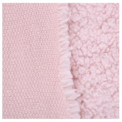 China Factory Wholesale 230gsm Polyester Skin Friendly 100% Sherpa Fleece Knitting Fabric Breathable For Autumn And Winter Pajamas for sale