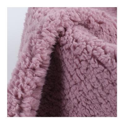 China Factory spot breathable 100% polyester 330gsm knitted elastic plain sherpa fleece fabric for making toys for sale