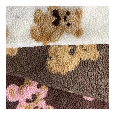 China 2022 fashion breathable warm 100% polyester 500gsm grain cashmere teddy fleece fabric for winter clothing for sale