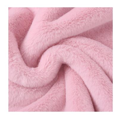 China 2022 Fashion Breathable Warm 100% Fine Knitted Polyester 500gsm Rabbit Fur Flannel Fleece Fabric For Winter Apparel for sale