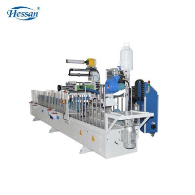 China Hotels Woodworking Machinery PLC Control MDF Profile Wrapping Wood Processing Machine for sale