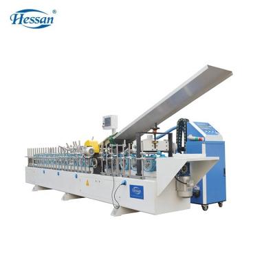 China Hotels Guangzhou Hessan PVC Veneer HPL Sheet PUR COMPLETE Profile Wrapping Machine for sale