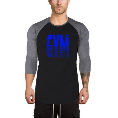 China Anti-wrinkle GYM monogram printed seven-quarter sleeve fitness tshirt men Sports Fitness T-shirt for sale