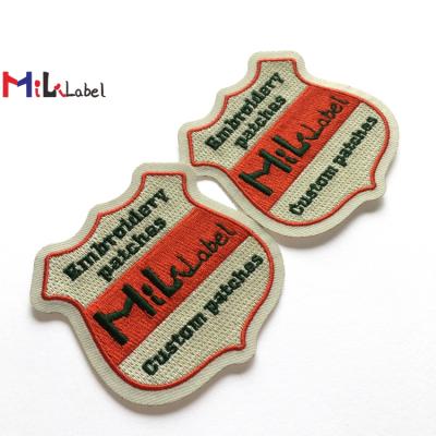 China 100% custom embroidered 100% embroidery patch for clothing iron on backing laser cut without border merrowed iron on patches for clothes for sale