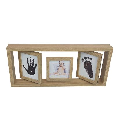 China Mengkai Modern Elegant Hot Sale Natural Wood Rotating Photo Frame For Baby Shower Gift for sale