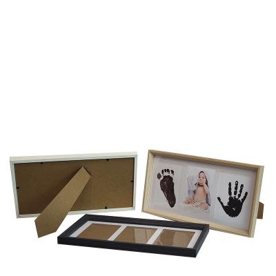 China Mengkai New Classic/Postmodern Newborn Baby Kindergarten Handprint Footprint DIY Photo Frame Baby Registration Bases Decoration for sale